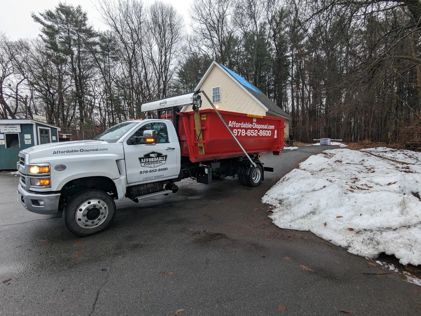 Dumpster loaded with construction debris